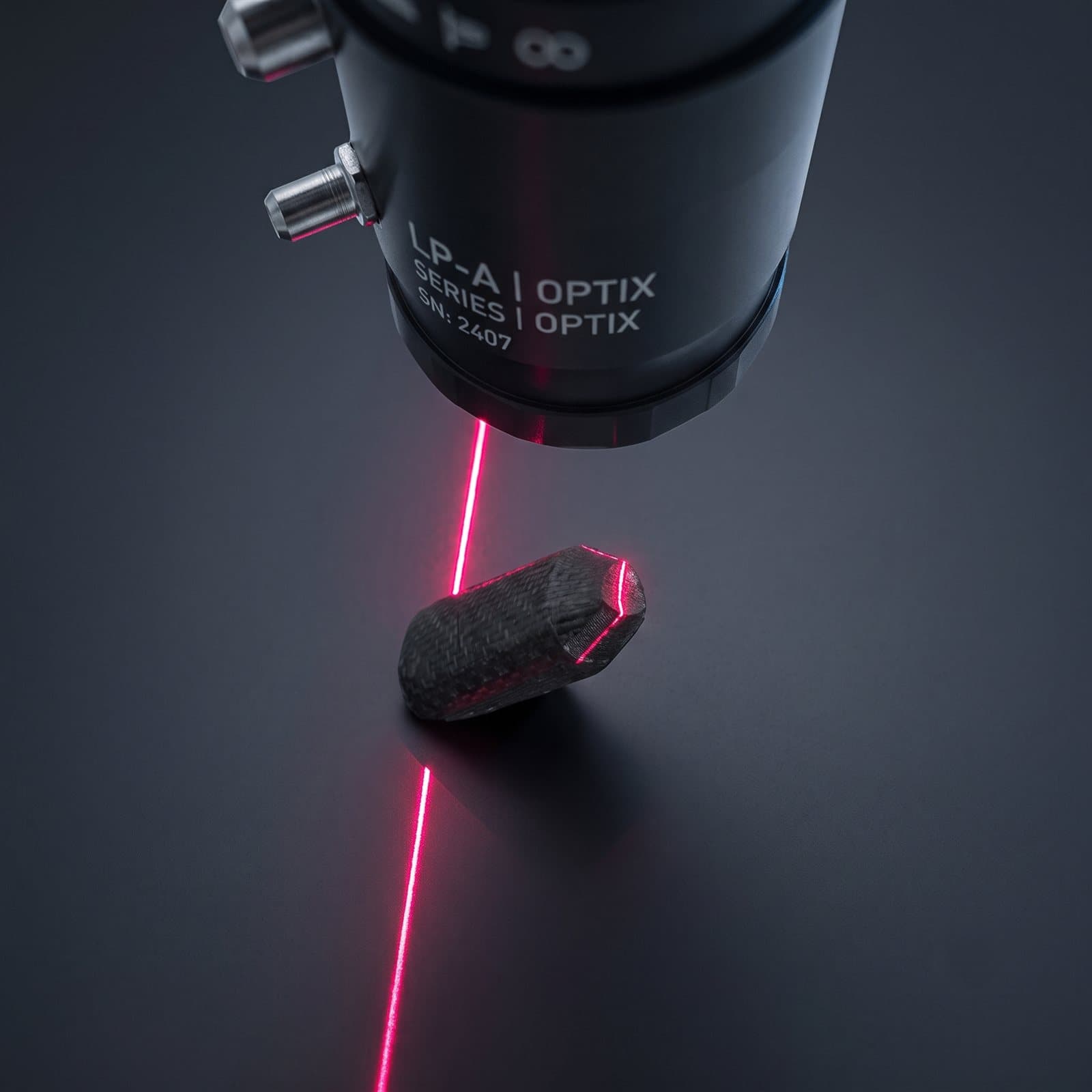 Line laser projecting a profile line across the object surface